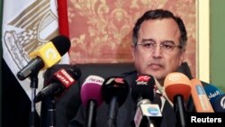 Egypt's new foreign minister, Nabil Fahmy, speaks during a news conference in Cairo, July 20, 2013. 