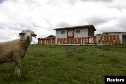 A sign of Peruvian presidential candidate Keiko Fujimori is seen in the district of Piuray, ahead of Sunday's election, in Cuzco, April 9, 2016.