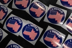 Voters cast their ballots at City of Miami fire station 7 in Miami, Florida on November 3, 2020. (Photo by Eva Marie UZCATEGUI / AFP)