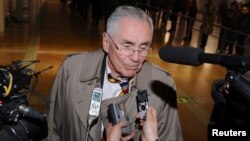 FILE - Donald Gregg, a former U.S. ambassador to South Korea, shown speaking to reporters in Beijing after a visit to North Korea in February 2014, says U.S.-South Korea relations “are in no danger at all" because of an attack on Ambassador Mark Lippert.