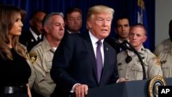 President Donald Trump speaks after meeting with first responders and private citizens who helped during the mass shooting, at the Las Vegas Metropolitan Police Department, Oct. 4, 2017, in Las Vegas.