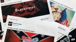 FILE - Some of the Facebook ads linked to a Russian effort to disrupt the American political process and stir up tensions around divisive social issues, released by members of the U.S. House Intelligence committee, are photographed in Washington.