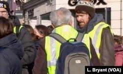 The yellow vests encompass all ages and many backgrounds.