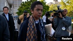 Hip hop artist Lauryn Hill leaves United States Court after a sentencing on federal tax evasion charges in Newark, New Jersey, May 6, 2013.