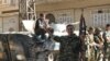 Binh sĩ Syria tràn vào làng mạc, trong khi bạo lực lan sang Li băng