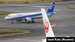 Máy bay của ANA và Japan Airlines. [Ảnh minh họa]