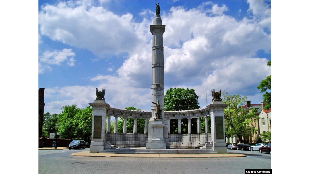 FILE - A memorial to Confederate President Jefferson Davis is seen along Monument Avenue in Richmond, Va.