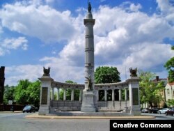 FILE - A memorial to Confederate President Jefferson Davis is seen along Monument Avenue in Richmond, Va.