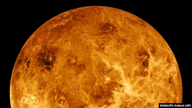 FILE - This image made available by NASA shows the planet Venus made with data produced by the Magellan spacecraft and Pioneer Venus Orbiter from 1990 to 1994.