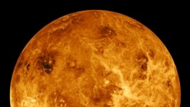 FILE - This image made available by NASA shows the planet Venus made with data produced by the Magellan spacecraft and Pioneer Venus Orbiter from 1990 to 1994.