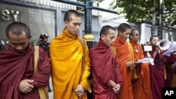 Buddhist monks offer prayers during a demonstration outside the Myanmar Embassy in Bangkok, Thailand (File)