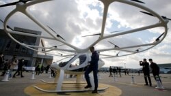 A pilot gets off a "Volocopter 2X" drone taxi during an Urban Air Mobility Airport Demo event at Gimpo Airport in Seoul, South Korea, November 11, 2021. (REUTERS/Heo Ran)