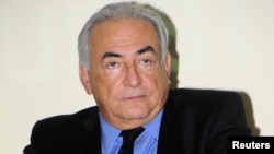 Former IMF head Dominique Strauss-Kahn looks on during a news conference at the Private University of Marrakech, Sept. 21, 2012.