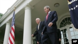 President Bush and Vice President Cheney walk to the Rose Garden for the swearing-in of Rob Portman, former congressman and U.S. trade representative, as director of the president's Office of Management and Budget. (By Pablo Martinez Monsivais, AP)