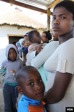 Patients wait to see the nurse inside the health point at Masizini (D. Taylor/VOA)