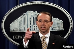 FILE - Deputy Attorney General Rod Rosenstein during a news conference at the Justice Department in Washington, Oct. 17, 2017.