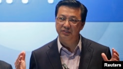 FILE - Malaysia's Transport Minister Liow Tiong Lai speaks during a news conference at a hotel near the Kuala Lumpur International Airport in Sepang, July 19, 2014. 