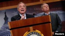 FILE - U.S. Senator Richard Durbin (D-IL) and Senator Lindsey Graham (R-SC) speak about proposed legislation to deal with so-called "Dreamers," children of undocumented immigrant families who were covered under the Deferred Action for Childhood Arrivals Act, May 9, 2017.
