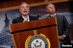FILE - U.S. Senator Richard Durbin (D-IL) and Senator Lindsey Graham (R-SC) speak about proposed legislation to deal with so-called "Dreamers," children of undocumented immigrant families who were covered under the Deferred Action for Childhood Arrivals(DACA).