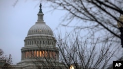 FILE - The Capitol is seen in Washington, Dec. 5, 2017, days before President Donald Trump signed a stopgap measure giving lawmakers and the White House until Dec. 22 to work out a final spending bill that will keep the government operating.