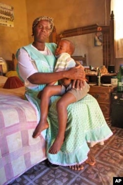 HIV infected mother Cynthia Mkhize clutches her son, Bongamusa.... Fortunately, the boy has been born without HIV....