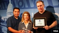 L to R: Bezhan Hamdard, Carolyn Presutti, and Jeff Swicord (Mike Burke missing) with their awards.