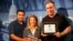 L to R: Bezhan Hamdard, Carolyn Presutti, and Jeff Swicord (Mike Burke missing) with their awards.