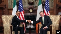 US President Barack Obama, left, and Taoiseach Enda Kenny shake hands during talks in Farmleigh, Dublin, May 23, 2011