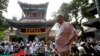 منع ریش برای مردان و نقاب برای زنان در شینجیانگ چین