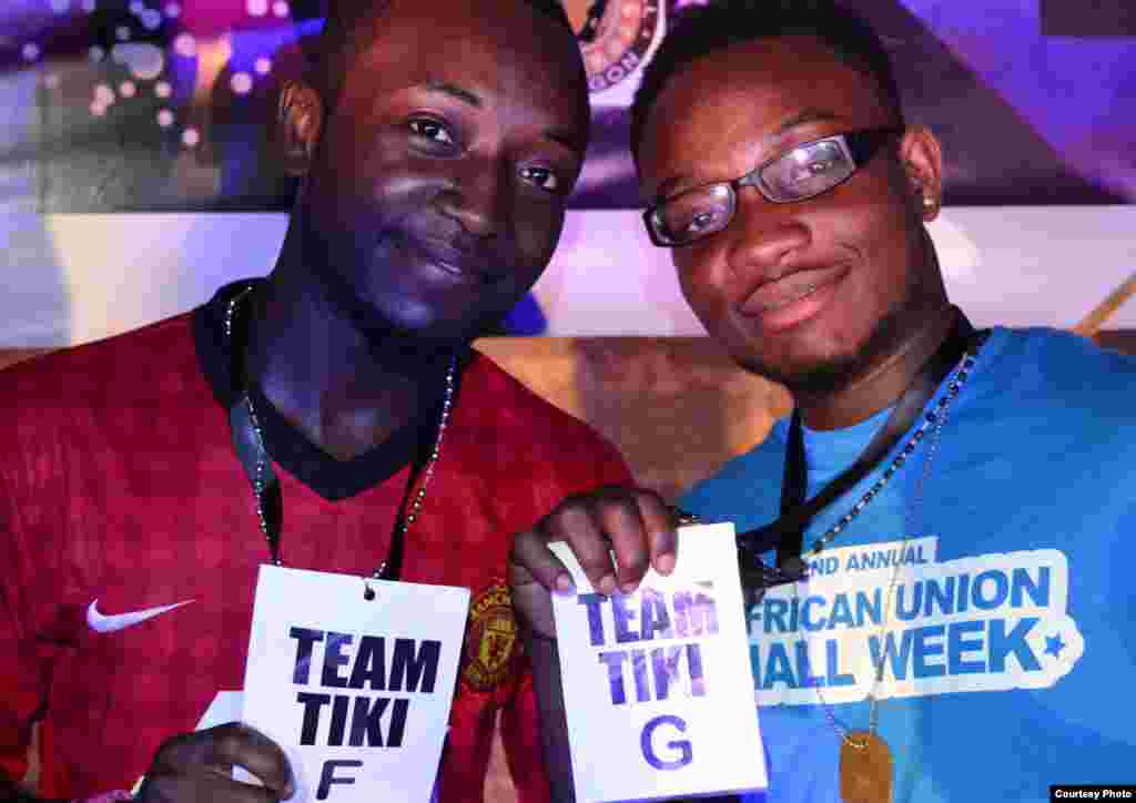A couple of Team Tiki staffers, Flint (left) and Noble, helped to host the Africa Union Hall party in 2013. (Courtesy Team Tiki)