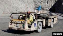 FILE - A worker drives a vehicle at Zimplats' Ngwarati Mine in Mhondoro-Ngezi May 30, 2014. Leaked documents allege Zimplats used an offshore company to pay management salaries without the knowledge of the Reserve Bank of Zimbabwe.