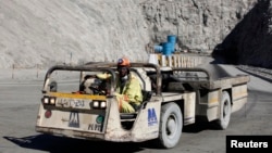 FILE - A worker drives a vehicle at Zimplats' Ngwarati Mine in Mhondoro-Ngezi May 30, 2014. Leaked documents allege Zimplats used an offshore company to pay management salaries without the knowledge of the Reserve Bank of Zimbabwe.