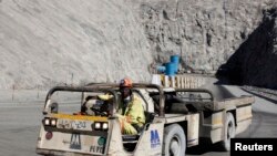 FILE - A worker drives a vehicle at Zimplats' Ngwarati Mine in Mhondoro-Ngezi May 30, 2014. Leaked documents allege Zimplats used an offshore company to pay management salaries without the knowledge of the Reserve Bank of Zimbabwe.