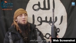 A screenshot depicts a Chechen suicide bomber from a Furat Media propaganda video, released on July 6, distributed by the SITE Intelligence Group.