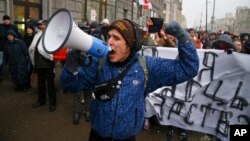Belarusians shout slogans during a rally in support of sole traders in the city center in Minsk, Belarus, Feb. 28, 2016. 