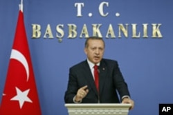 Turkey's Prime Minister Tayyip Erdogan speaks during a news conference in Ankara, Turkey, October 19, 2011.