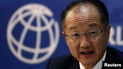 FILE - World Bank President Jim Yong Kim is seen speaking at a news conference.
