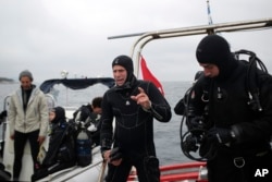 Lead archeologist for the project of opening wrecks to visitors, Dimitris Kourkoumelis, prepares to dive to a 5th Century B.C. shipwreck, near the coast of Peristera, Greece, April 7, 2019.