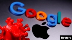 3D printed coronavirus model and Google logo are placed near an Apple Macbook Pro in this illustration taken April 12, 2020. REUTERS/Dado Ruvic/Illustration