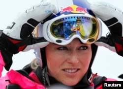 FILE - Lindsey Vonn, shown in 2012, says injuries to her left knee will end her ski season.