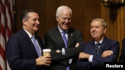 Republican Senators Ted Cruz, left, John Cornyn, center, and Lindsey Graham, right, chat during a break in the hearing on the nomination of Brett Kavanaugh to be an associate justice of the Supreme Court of the United States, on Capitol Hill in Washington