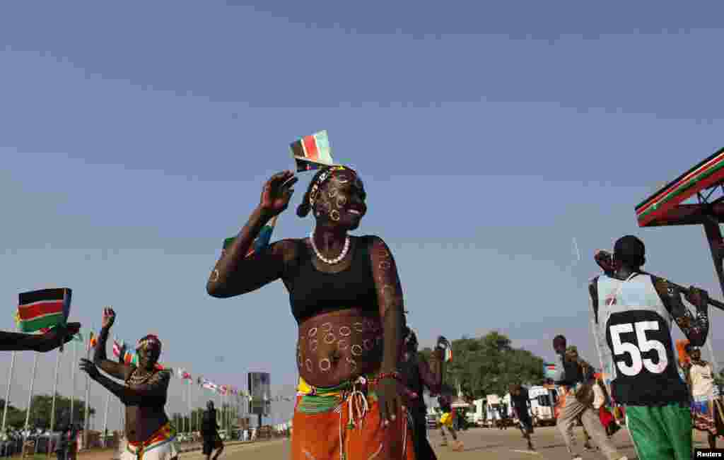 A traditional dancer takes part in celebrations marking the third anniversary of South Sudan's independence, in Juba, July 9, 2014. 