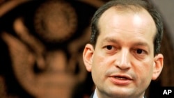 FILE - U.S. Attorney R. Alexander Acosta talks to reporters during a news conference in Miami.