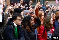 New York City high school students staged a midday walkout Tuesday afternoon, chanting “Dump DeVos," a reference to newly confirmed U.S. Secretary of Education Betsy DeVos, Feb. 7, 2017. (R. Taylor/VOA)