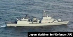 A South Korean naval warship is seen as it allegedly locks its fire-control radar on a Japanese warplane, Dec. 21, 2018, in the disputed waters north of Japan.