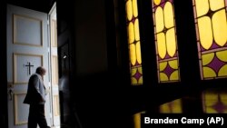 Black Americans attend church more regularly than Americans overall and pray more often. Most of them attend churches that are predominantly Black, but would like their churches to become racially diverse. (AP Photo/Branden Camp)