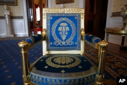 This Sept. 17, 2019, photo shows a restored chair in the Blue Room of the White House.