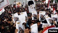 Supporters of Shi'ite cleric Moqtada al-Sadr protest against the execution of Shi'ite Muslim cleric Nimr al-Nimr in Saudi Arabia, during a demonstration in Baghdad Jan. 4, 2016.
