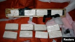 FILE - The U.S. Drug Enforcement Administration (DEA) of the U.S. Department of Justice released photo shows heroin seized from "Seaboard Pride" at Port of Miami, Florida on January 10, 2012 and released in New York on February 4, 2014.