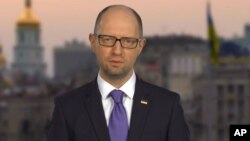 Ukraine’s embattled Prime Minister Arseniy Yatsenyuk said in a televised statement that he is resigning, opening the way for the formation of a new government to end a drawn-out political crisis, in Kyiv, April 10, 2016.